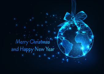 Wall Mural - Merry Christmas and Happy New Year greeting card with world globe as a hanging ball and ribbon bow.