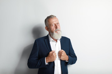 Sticker - Portrait of handsome senior man on white background