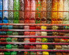 Colorful Candy Store Shelves With Variety Of Flavors