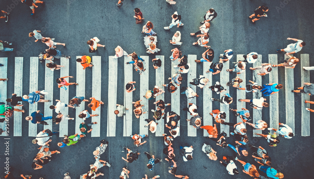 Aerial. People crowd on pedestrian crosswalk. Top view background. Toned image. - obrazy, fototapety, plakaty 