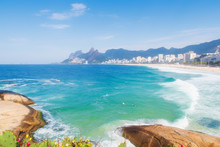 Seascape Of Rio De Janeiro Beaches Depicting Arpoador Beach And Rocks With A Green Sea