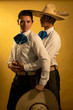 © Gener Vázquez - Charro Mexican young gay homosexual couple Mariachi holding in love
