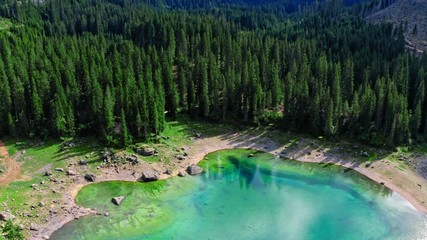 Wall Mural - majestic aerial view of carezza lake in dolomites
