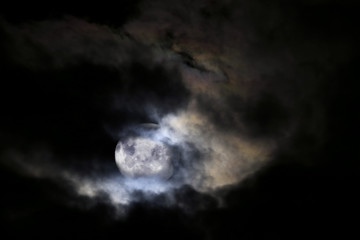 spooky moon with clouds