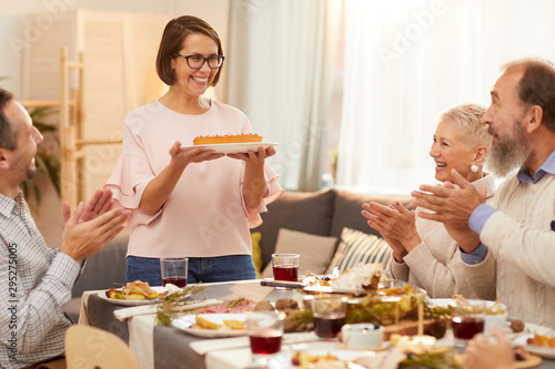 Happy Woman With Short Hair In Eyeglasses Holding Sweet Cake And