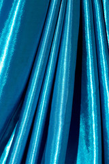 Canvas Print - Blue silk fabric as an abstract background