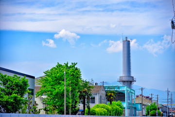 Blue sky and factory chimney