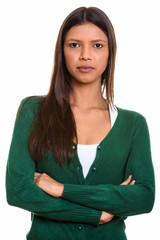 Wall Mural - Close up of young beautiful Brazilian woman with arms crossed