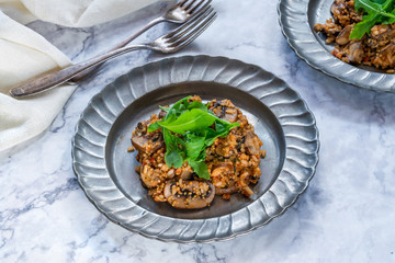 Sticker - Mushroom, chorizo and thyme risotto with rocket lettuce