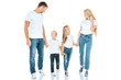 © LIGHTFIELD STUDIOS - happy parents holding hands with cute kids on white