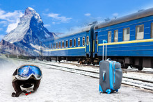 Suitcase At The Station In Winter. Travel Concept.