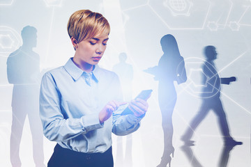 Wall Mural - Businesswoman with smartphone, digital interface