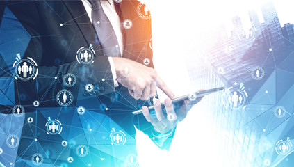 Man using tablet in city, HR interface