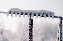 Garden Rake Covered With Snow And Frost