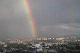 Fototapeta Tęcza - Rainbow after rain over the city