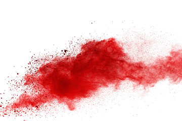 Red powder explosion on white background. Colored cloud. Colorful dust explode. Paint Holi.