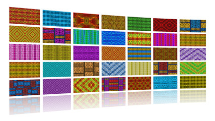 Wall of African fabrics, white background