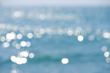 Lights on sea background. Waves.