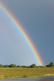 Fototapeta Tęcza - Rainbow over Farm Field
