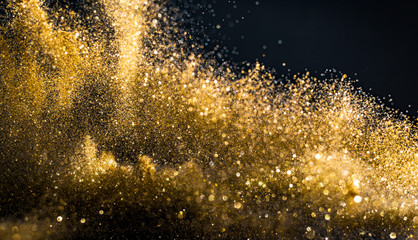 Wall Mural - glitter lights grunge background, gold glitter defocused abstract twinkly gold lights background.