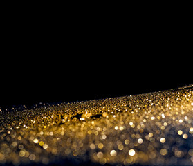 Wall Mural - glitter lights grunge background, gold glitter defocused abstract twinkly gold lights background.