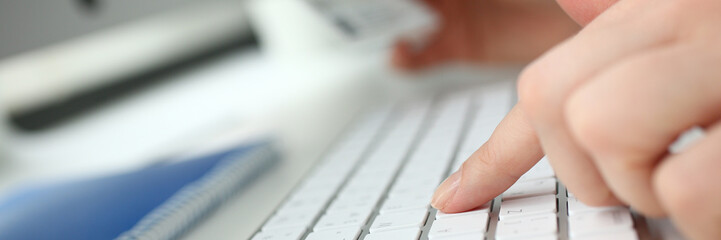 female arms hold credit card press buttons making transfer closeup. anti-fraud financial security wh