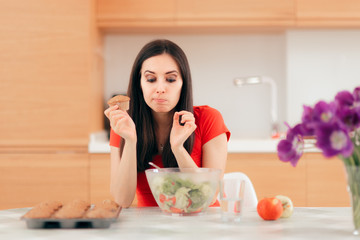 Woman Eating a Cupcake instead of Apples or Salad