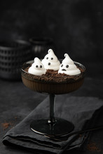 Halloween Dessert Idea - Cocolate Panna Cotta With Chocolate Cookie Crumbes And Meringue Ghosts