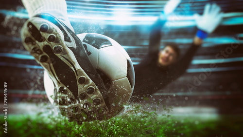 Fotomural Football scene at night match with close up of a soccer shoe hitting the ball wi