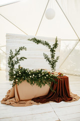 Wall Mural - Festive decoration of the wedding tent in wood color scheme. Table of newlyweds, decorated with fresh flowers. An empty wedding tent.