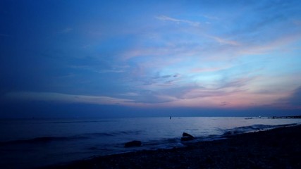 Wall Mural - Timelapse footage tropical coastline over sunset background