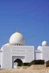 low angle view on sheikh zayed grand mosque by clear blue sky