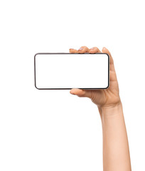 Fototapete - Woman holding frameless smartphone with white blank screen
