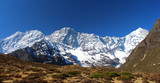 Fototapeta Krajobraz - View of Kongde Ri mountain in the morning in Sagarmatha national park in Nepal. The mountain is classified as a trekking peak, but it is considered one of the more difficult to climb.