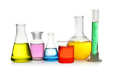 Laboratory Glassware With Colorful Liquids On White Background