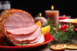 © New Africa - Plate with delicious ham served on wooden table, closeup. Christmas dinner