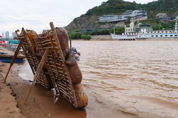 Sheepskin raft by the Yellow River in Lanzhou Gansu China