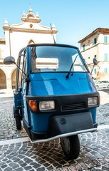 Wall Mural - Typical italian farm ape truck on three wheels.