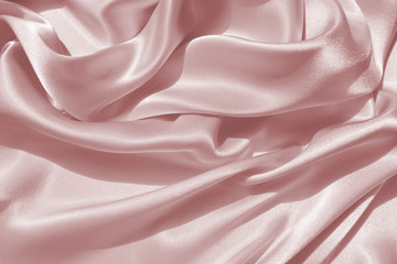 Wall Mural - Delicate satin draped fabric pink texture for festive backgrounds