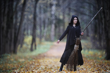 Wall Mural - A woman in a witch suit in a forest