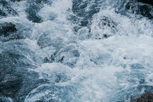 Rough Water Of Sea Surf. The Water Boils In Rapid Flow Of River