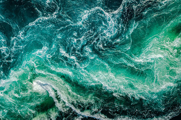 Waves of water of the river and the sea meet each other during high tide and low tide.