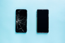 Modern Touch Screen Smartphone With Broken Screen And New One On Blue Background, Top View