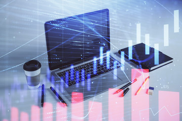 Forex graph hologram with desktop office computer background. Double exposure. Concept of financial analysis.