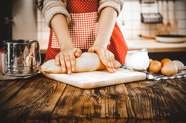 Wall Mural - Woman hands in kitchen and free space for your decoration. 