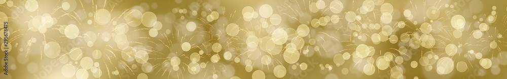 Goldener Silvesterhintergrund mit Feuerwerk im breiten Format - obrazy, fototapety, plakaty 
