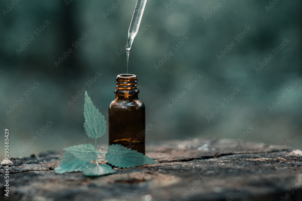 bottle of essential oil aromatherapy modern apothecary  - obrazy, fototapety, plakaty 