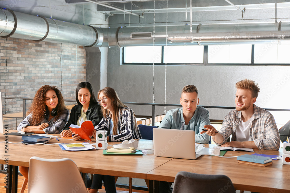 Group of students preparing for exam in university