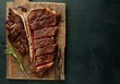 © александр таланцев - Grilled T-bone steak on a stone table. With copy space for your text.