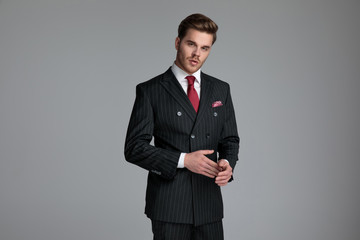 young fashion model wearing double breasted suit